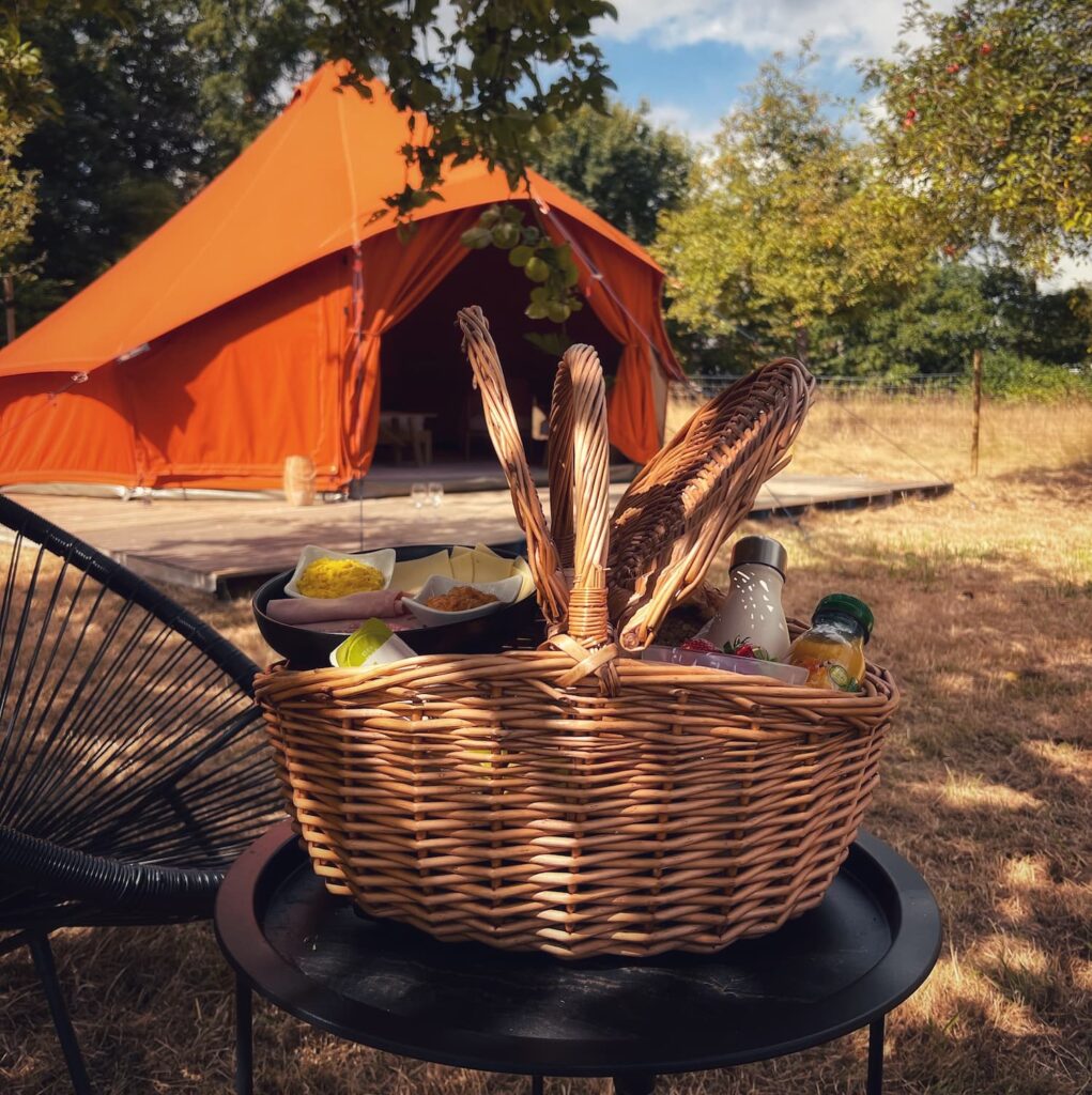Autentic | Luxury Glamping Bell Tents - Orange 5m glamping bell tent set up at the glamping site of Canvas Nights