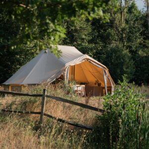 Autentic | Luxury Glamping Bell Tents - Autentic Desert Billy-Joe Double Bell Tent in the middle of the forest dressed up for a dinner event