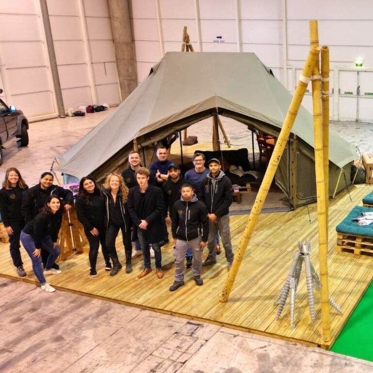 Autentic | Luxury Glamping Bell Tents - The Glamping Revolution team in front of the Autentic Double Bell Tent at the Nauticampo fair in Portugal