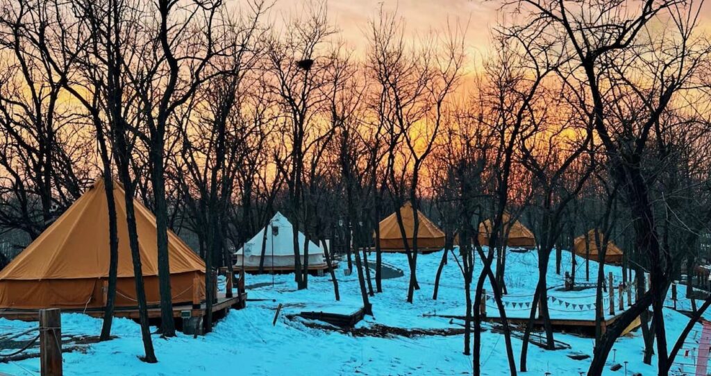 Autentic | Luxury Glamping Bell Tents - Autentic bell tents set up in a snowy surrounding at Hillands Glamping in China