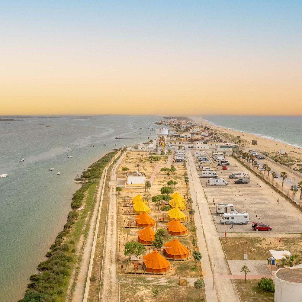 Autentic | Luxury Glamping Bell Tents - Drone shot of luxury Autentic bell tents set up at Glamping Revolution in Portugal