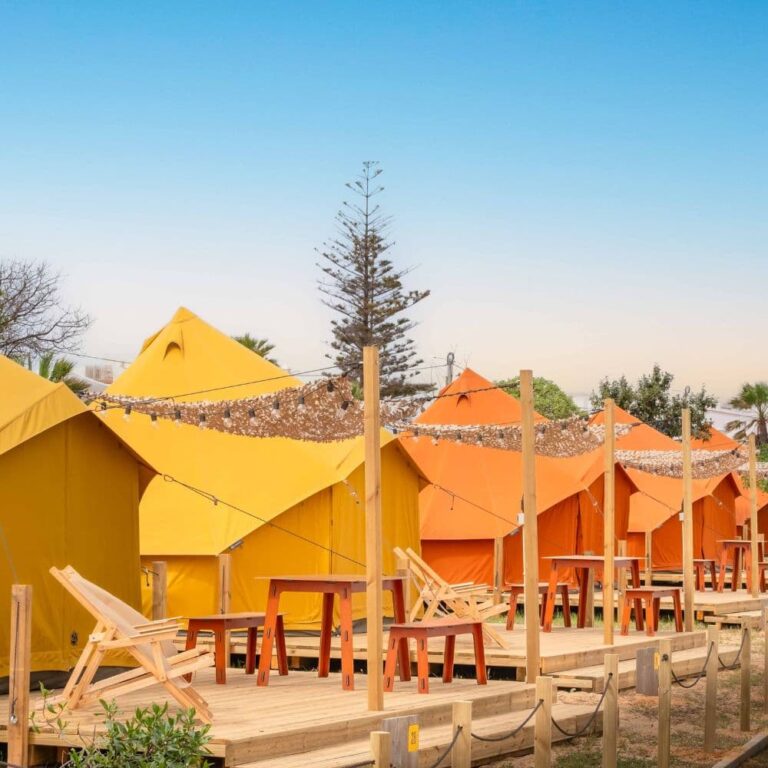 Autentic | Luxury Glamping Bell Tents - Colourful Autentic bell tents next to each other at Glamping Revolution in Portugal